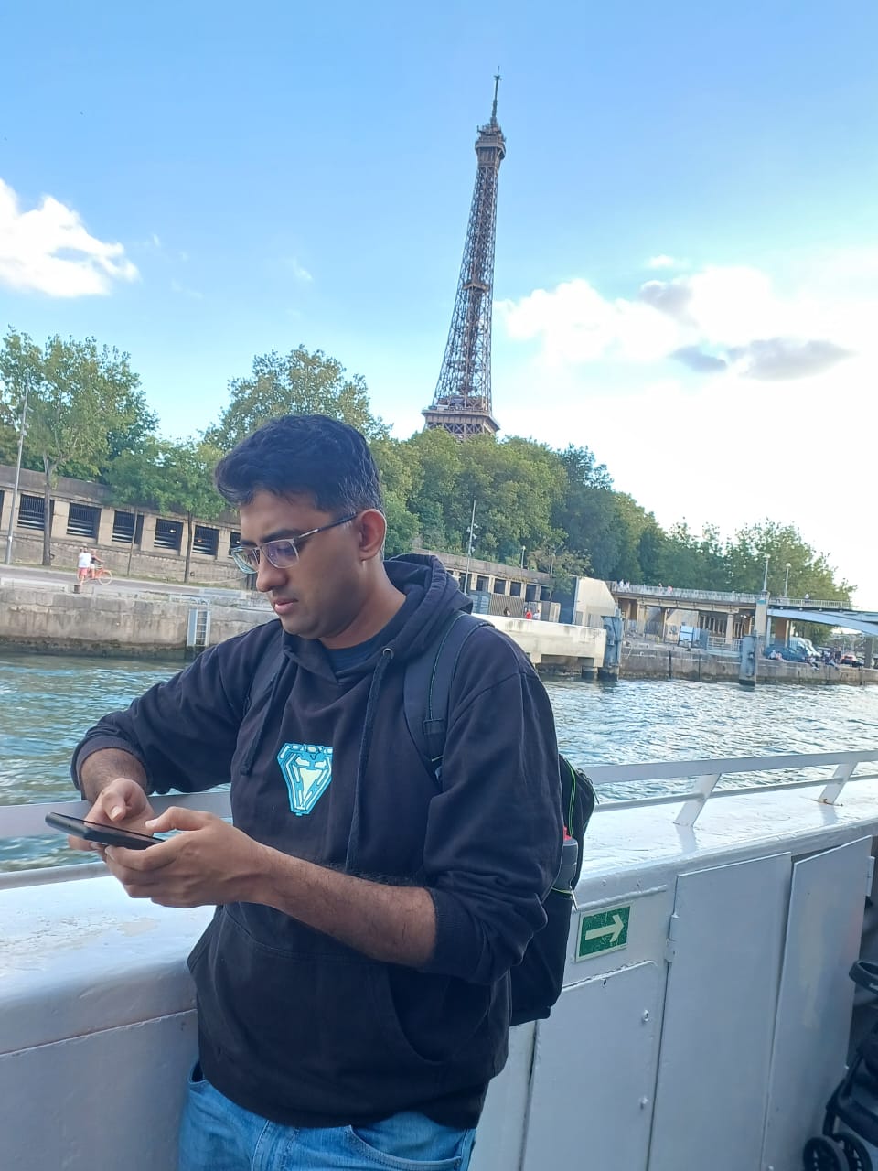Rohit in Paris by the Eiffel Tower